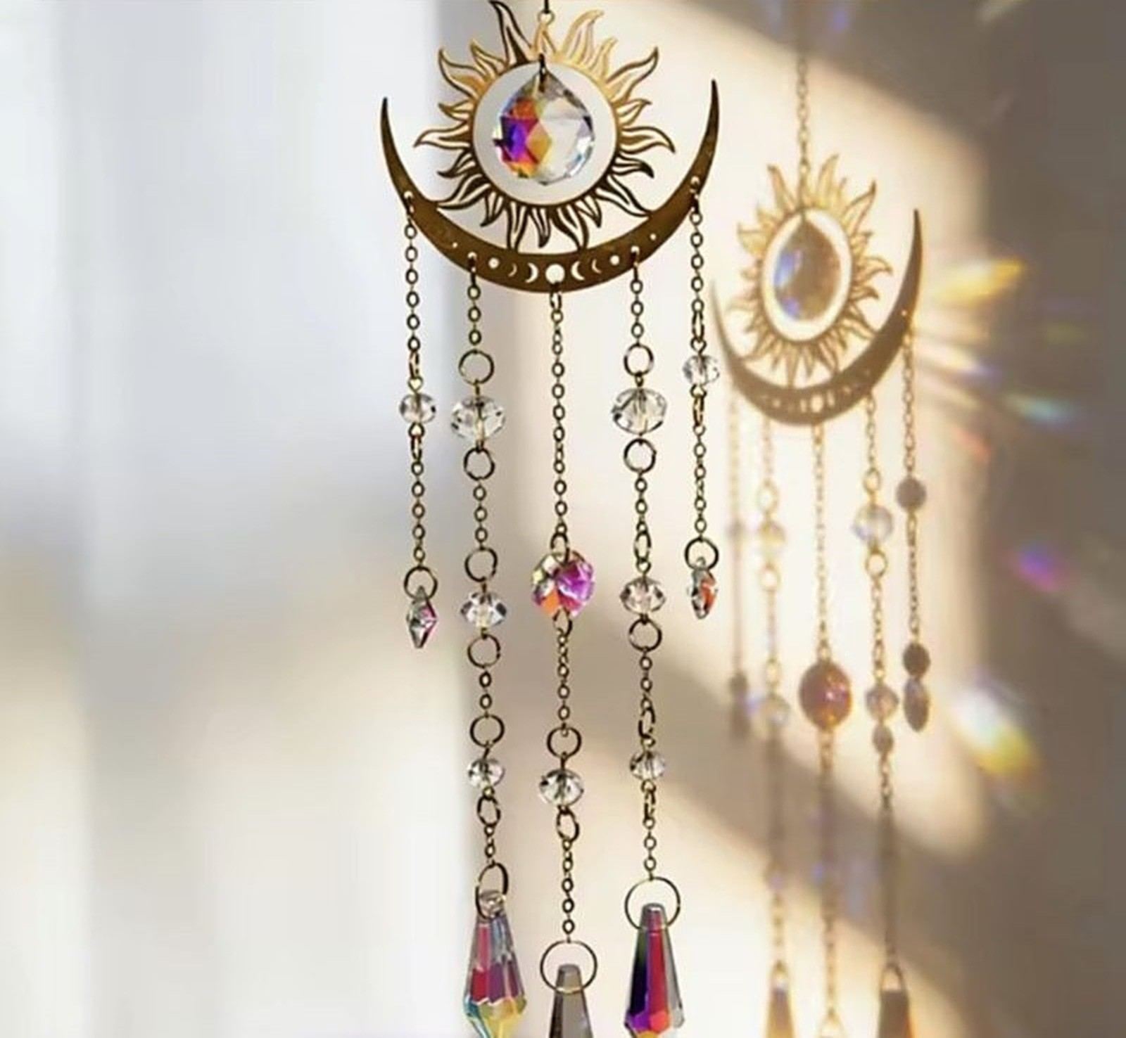 Sun and moon crystal suncatchers catching the light